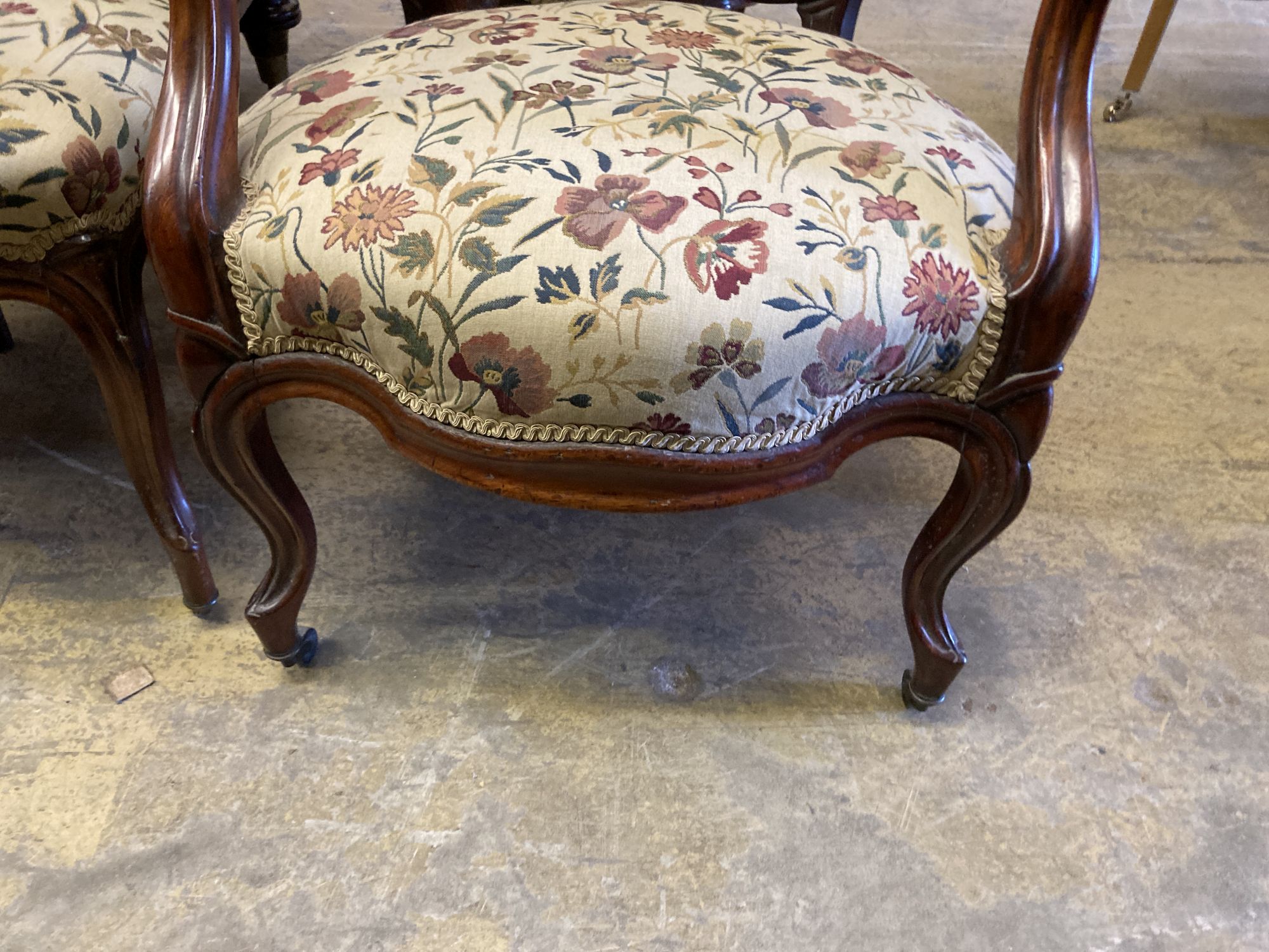 A pair of 19th century German mahogany armchairs and two side chairs